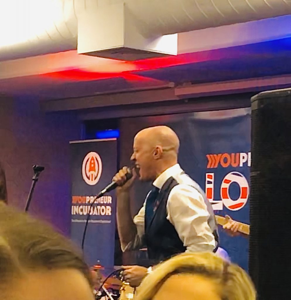 Chris Ducker singing at Youpreneur Summit 2019